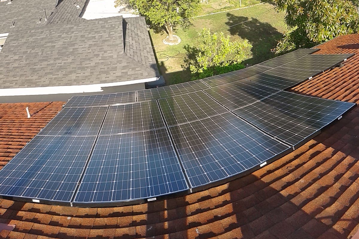 Photo of Orange LG solar panel installation at the Fey residence